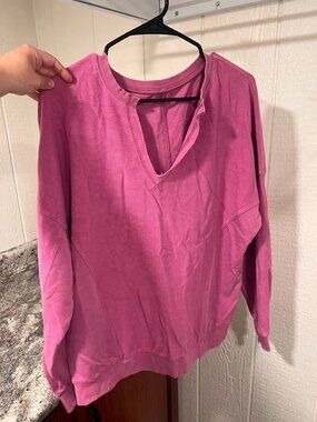 distressed pink crewneck